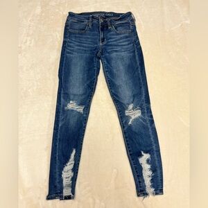 Distressed Women’s Blue Denim Jeans